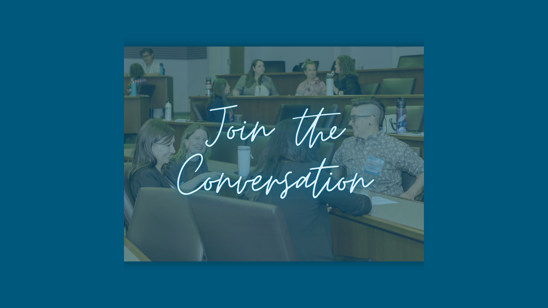 Promotional banner with people in a conference room and the script text 'Join the Conversation' across a teal-tinted overlay.